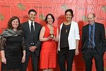 From left to right, Linda Lutton, Ben Calhoun, Julie Snyder, Robyn Semien and Alex Kotlowitz at the 73rd Annual Peabody Awards. Snyder holds the group's Peabody Award for their work on "Harper High School" episode of This American Life.