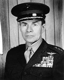 A black and white image of Keith McCutcheon, a white male in his Marine Corps dress uniform