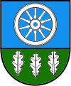 A coat of arms depicting a white wheel on a light blue background at the top and three white leaves on a green background at the bottom