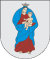 A coat of arms depicting a woman clothed in blue and brown wearing a golden crown and carrying a baby all on a grey background