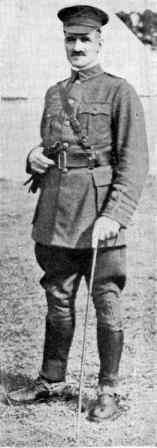 a full length view of a man in uniform with a cane