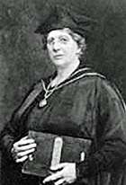 head and shoulders image of a woman in academic cap and gown