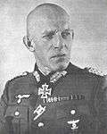 bald male in German uniform with no cap