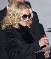 Madonna signing an autograph