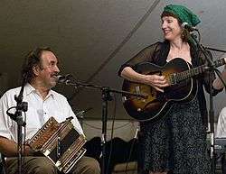 Marc and Ann Savoy playing Cajun accordion and guitar respectively at the Balfa camp.