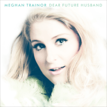 The name Meghan Trainor is written in bold print at top left, the title "Dear Future Husband" stands beside it. A woman with blue eyes and blonde hair wearing a coat looks towards the camera below the text.