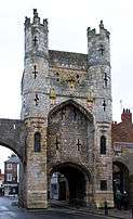 Photograph of the same stone gatehouse