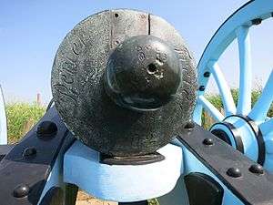 Close up photo shows the 4-pounder cannon's breech.