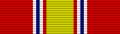 A multicolored military ribbon. From left to right the color pattern is; very thick red stripe, thin white stripe, thin blue stripe, thin white stripe, thin red stripe, very thick gold stripe, thin red stripe, thin white stripe, thin blue stripe, thin white stripe, very thick red stripe.