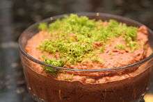 A bean dip prepared with kidney beans, garnished with lime zest