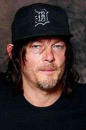 Norman Reedus looking to the front.