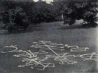 Picture of figures drawn in chalk on the ground