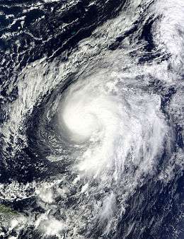 A satellite image showing a minimal hurricane in the central Atlantic.