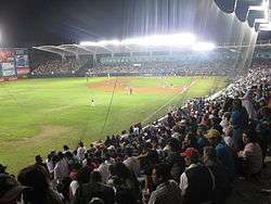 photo of stadium interior during a night time game