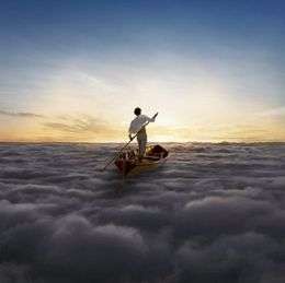 A man in a white shirt and tan pants stands in a Thames skiff at the center of the image. He stand-up paddles the Thames skiff across a sea of clouds, heading towards the Sun.