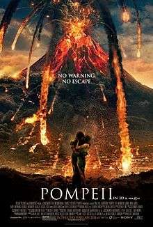 A Volcano erupting. In the foreground and a man and a woman are embracing. In the centre of the poster the tagline: No Warning. No Escape