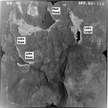 Black and white aerial photo of four lakes (labeled per the caption) with a deep Y-shaped valley at bottom. The photo is labeled at top: "6-4-39" and "ARB-95-115".