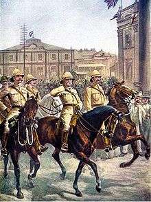 Lord Robert's entry into Kimberley, showing jubilant crowds outside the town hall as Roberts takes the salute on horseback