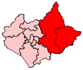 A very large constituency. It consists of the eastern portion of the county. It also includes the entirety of a second, smaller county, located to the east of the larger county.