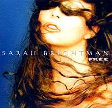 A portrait backed in the colour of blue of the front facial profile of a brunette woman. The woman has slightly curled hair which is blown to the left across her face. In the centre of the portrait in thin, white, capital font is her name 'Sarah Brightman' with the title 'Free' visible in a reduced font directly below it on its right corner.