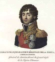 Color print of curly-haired man in a dark blue uniform with epaulettes and gold braid