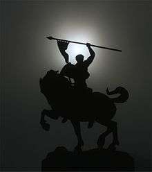 Solar corona above statue of El Cid