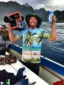 Sonny Miller enjoying a beer after a long filming session at Teahupoo