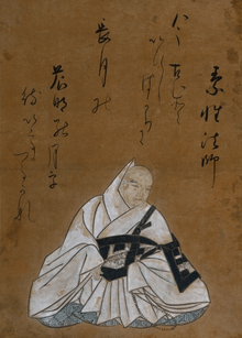 A Japanese monk in a ceremonial white robe