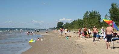 Beach and bathers at Southwick Beach State Park.