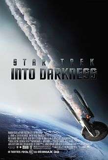 The poster shows a flaming starship falling toward Earth, with smoke coming out of it. The middle of the poster shows the title "Star Trek Into Darkness" in dark gray letters, while the production credits and the release date are shown at the bottom of the poster.