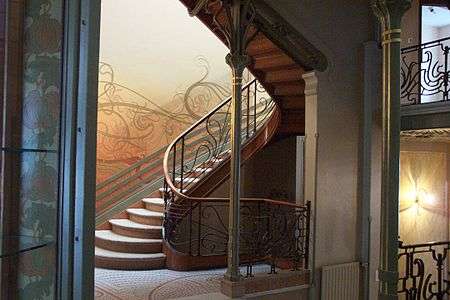 A medium-sized stairway that spirals as it climbs.