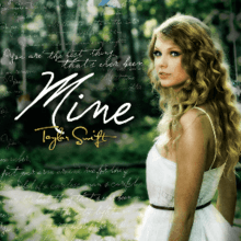 A blonde woman is standing aside in a white dress, looking forward. Next to her, the word "Mine" is written in white. Under the word "Mine", the words "Taylor Swift" are printed in yellow. Faded lyrics from the songs are above the word "mine'.