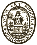 Logo: A seal picturing a crowned naked woman holding a goblet in her left hand and a skull in her right, standing in front of a desk with the words "Alma mata Cantabria" on it. The seal is surrounded by the words "Hinc lucem et pocula sacra".