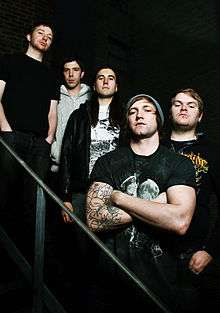A press shot of the members of The Divided