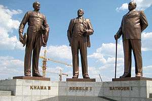 Three bronze statues