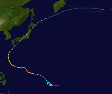Satellite image of the path of the typhoon. It starts in the Pacific Ocean east of the Philippines, arcs through Japan, and ends near the Aleutian Islands.