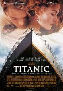The film poster shows a man and a woman hugging over a picture of the Titanic's bow. In the background is a partly cloudy sky and at the top are the names of the two lead actors. The middle has the film's name and tagline, and the bottom contains a list of the director's previous works, as well as the film's credits, rating, and release date.