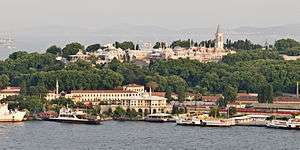 A close-up view of Topkapı Palace, with the Prince Islands in the background.