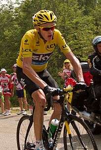 Chris Froome wearing a yellow cycling jersey.