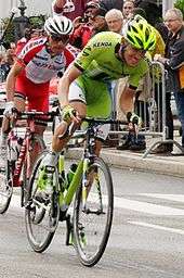 Alessandro De Marchi wearing a lime green cycling jersey.