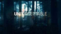 The word Unforgettable in white block type, against a blurred forest background