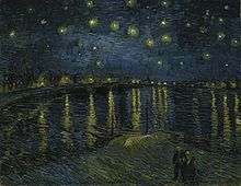  A view of a dark starry night with bright stars shining over the River Rhone. Across the river distant buildings with bright lights shining are reflected into the dark waters of the Rhone.