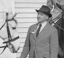 Captain Vladimir S. Littauer at a riding clinic he conducted at Sweet Briar College in February 1953. The photo was probably taken by the Public Relations office of the college. The negative of this photo was discovered in the photographic archive of Sweet Briar College in the fall of 2009 by SBC librarian Liz Kent Leon. It was scanned by SBC assistant professor of Studio Art, Paige Critcher, in October 2009.