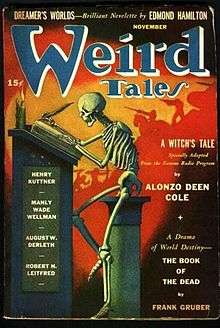 A skeleton writes with a quill pen at a high desk