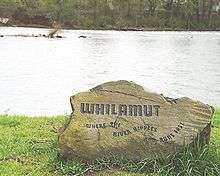 A boulder  engraved with the Kalapuyan "Whilamut" "Where the river ripples and runs fast"