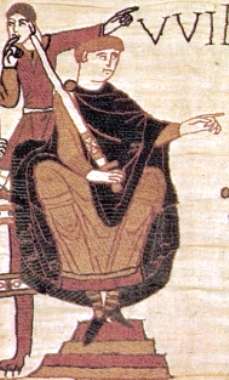 A seated man in robes holding a sword upright in one hand and pointing with his other hand. Behind the seated figure is a standing man pointing in the same direction as the seated figure.