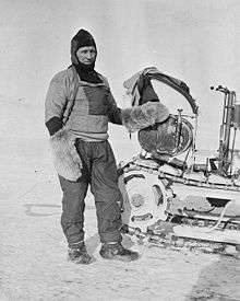 William Lashly standing by a Wolseley motor sleigh during the British Antarctic Expedition of 1911–1913, November 1911