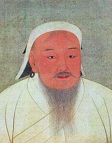 A head-shot style painting of a middle aged to older middle aged man with small eyes and eyebrows, but a long, grey beard and a thick grey mustache. He is wearing white robes and a white cap that folds over the head and hangs loosely at the back.